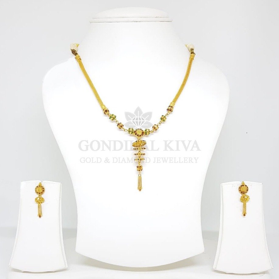 Intricate 22kt gold necklace accented with vibrant stones | Gold necklace  designs, Gold earrings designs, Gold jewelry fashion